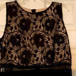 Beautiful lace top with slim mesh waistband and flowing skirt size 14.
